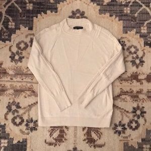Cream embellished mock turtleneck
